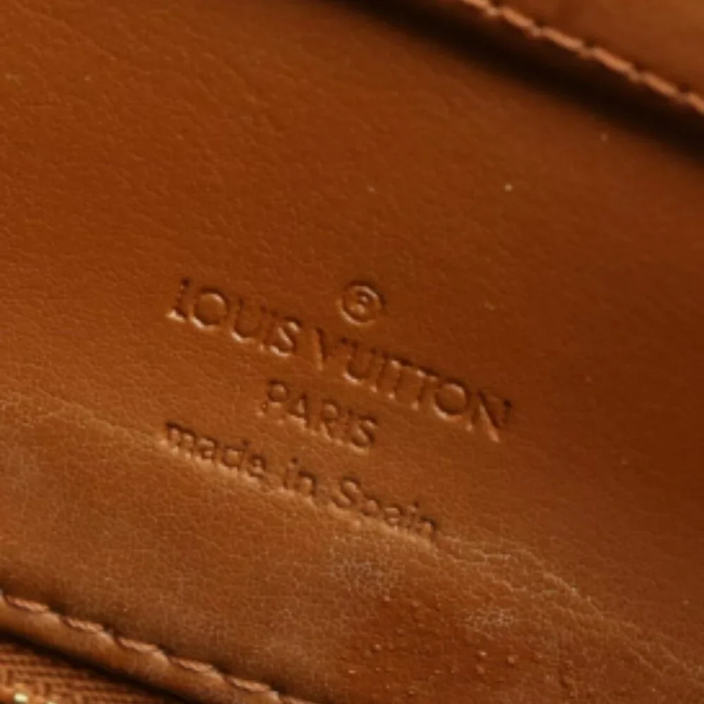 Louis Vuitton Monogram Vernis Houston tote bag in the color Bronze.